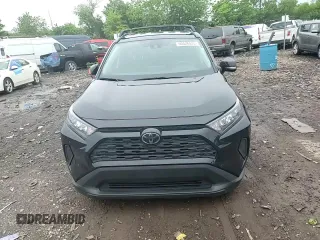 2019 Toyota RAV4 LE with VIN JTMG1RFV0KD506247, listed as a Copart auction lot 60426425 with 60,448 mi miles and Salvage title. Bid and sale history available at DreamBid. Image 14.