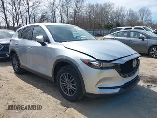 2020 Mazda CX-5 Touring with VIN JM3KFBCM3L0791816, listed as a IAAI auction lot 41761623 with 87,742 mi miles and . Bid and sale history available at carsss.com. Image 1.