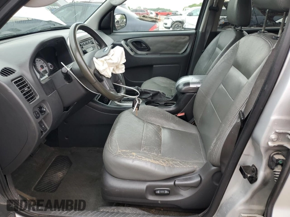 2006 Ford Escape XLT with VIN 1FMCU93156KA73772, listed as a Copart auction lot 55658445 with 217,335 mi miles and Salvage title. Bid and sale history available at DreamBid. Image 7.