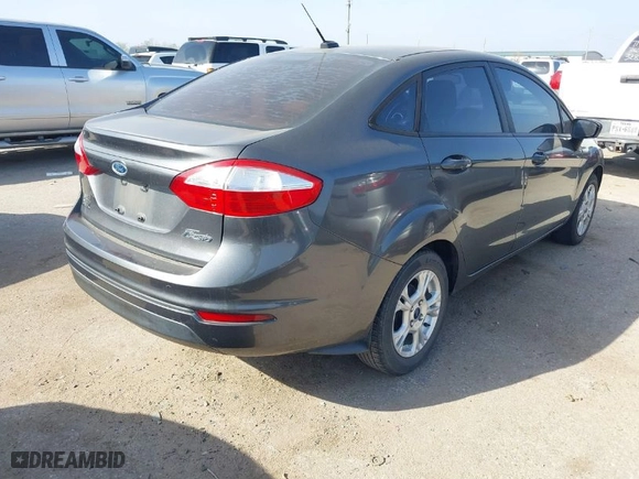 2016 Ford Fiesta SE with VIN 3FADP4BJ1GM143160, listed as a IAAI auction lot 41789400 with 96,908 mi miles. Bid and sale history available at carsss.com. Image 4.