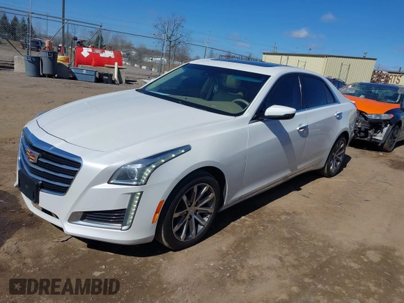 2016 Cadillac CTS Luxury Collection AWD with VIN 1G6AX5SS5G0153563, listed as a IAAI auction lot 41894418 with 82,722 mi miles and . Bid and sale history available at DreamBid. Image 2.