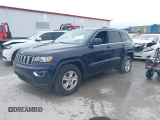 2017 Jeep Grand Cherokee Laredo with VIN 1C4RJFAGXHC912454, listed as a IAAI auction lot 42140735 with 138,895 mi miles and . Bid and sale history available at DreamBid. Image 2.
