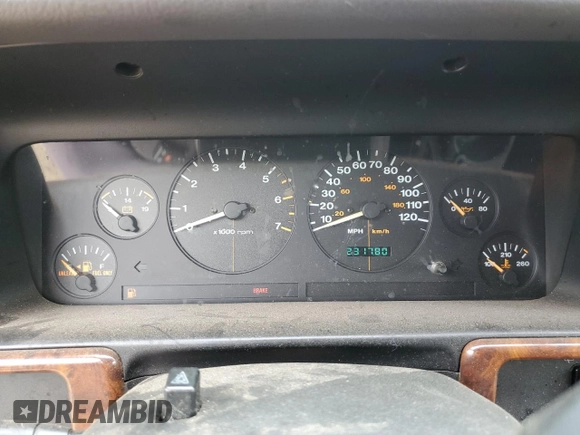 1996 Jeep Grand Cherokee Laredo with VIN 1J4GZ58S7TC403946, listed as a Copart auction lot 71785734 with 231,780 mi miles and Salvage Title. Bid and sale history available at carsss.com. Image 9.