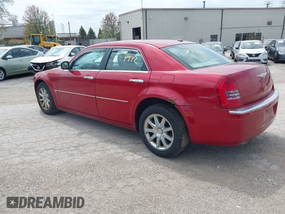 2007 Chrysler 300 C with VIN 2C3KA63H57H684368, listed as a IAAI auction lot 42144972 with 117,478 mi miles. Bid and sale history available at carsss.com. Image 3.