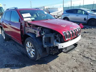 2014 Jeep Cherokee Limited with VIN 1C4PJMDB7EW219458, listed as a IAAI auction lot 41007909 with Not Provided miles and . Bid and sale history available at DreamBid. Image 6.
