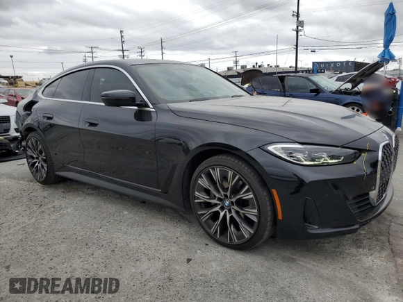2024 BMW 4 Series 430i with VIN WBA63AV04RFS25464, listed as a Copart auction lot 53543965 with 18,008 mi miles and Salvage title. Bid and sale history available at DreamBid. Image 4.