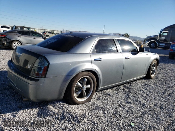 2007 Chrysler 300 C with VIN 2C3LA63H67H706530, listed as a Copart auction lot 88174615 with 104,505 mi miles and Salvage Title. Bid and sale history available at DreamBid. Image 3.