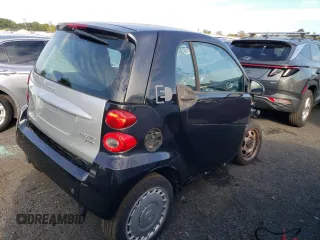 2013 Smart fortwo Passion z VIN WMEEJ9AA1DK717534, wystawiony jako Copart lot #73832094 z przebiegiem Nie podano mil oraz Tytuł czysty. Historia ofert i sprzedaży dostępna na DreamBid. Obrazek 3.