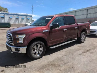 2016 Ford F-150 XLT with VIN 1FTEW1EG2GKD88539, listed as a Copart auction lot 56975835 with 142,775 mi miles and Salvage title. Bid and sale history available at DreamBid. Image 1.