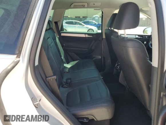 2014 Volkswagen Touareg Sport with VIN WVGEF9BP8ED005445, listed as a Copart auction lot 53694215 with 194,711 mi miles and Salvage Title. Bid and sale history available at DreamBid. Image 11.