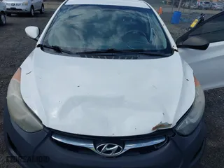 2013 Hyundai Elantra GLS with VIN 5NPDH4AE7DH453651, listed as a IAAI auction lot 42046462 with 204,244 mi miles. Bid and sale history available at carsss.com. Image 10.