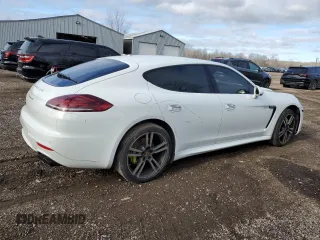 2014 Porsche Panamera S E-Hybrid z VIN WP0AD2A77EL044874, wystawiony jako Copart lot #80657424 z przebiegiem 73 809 mil mil oraz Szkody całkowita. Historia ofert i sprzedaży dostępna na DreamBid. Obrazek 3.