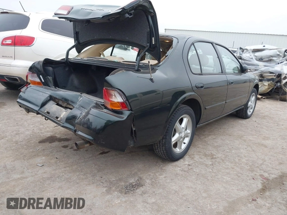 1998 Nissan Maxima GXE with VIN JN1CA21D4WT605270, listed as a IAAI auction lot 41505206 with 114,425 mi miles and . Bid and sale history available at DreamBid. Image 4.