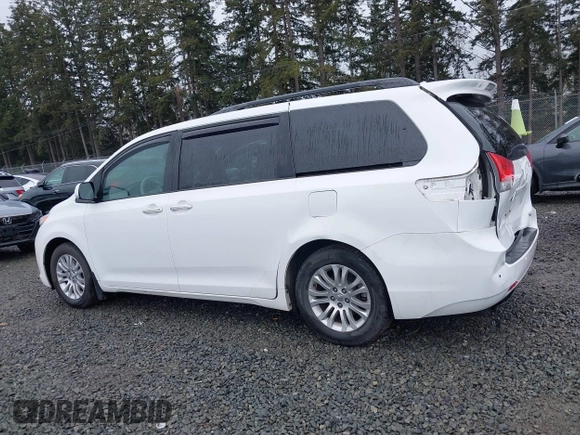 2014 Toyota Sienna XLE with VIN 5TDYK3DC2ES485846, listed as a IAAI auction lot 41693092 with 106,156 mi miles and . Bid and sale history available at DreamBid. Image 15.