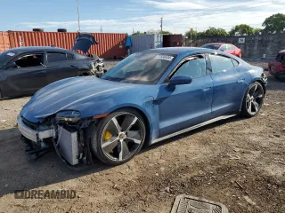 2021 Porsche Taycan Turbo z VIN WP0AC2Y12MSA63960, wystawiony jako Copart lot #71588534 z przebiegiem Nie podano mil oraz Szkoda całkowita • Salvage title. Historia ofert i sprzedaży dostępna na DreamBid. Obrazek 1.