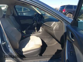 2015 Mazda 6 i Sport with VIN JM1GJ1U54F1196647, listed as a IAAI auction lot 41286544 with 133,654 mi miles and . Bid and sale history available at carsss.com. Image 5.