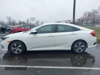 2020 Honda Civic LX with VIN 2HGFC2F66LH510069, listed as a IAAI auction lot 41860480 with 43,639 mi miles and . Bid and sale history available at DreamBid. Image 14.