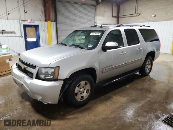 2013 Chevrolet Suburban LT with VIN 1GNSKJE76DR119873, listed as a Copart auction lot 53239445 with 197,172 mi miles and Salvage Title. Bid and sale history available at DreamBid. Image 1.