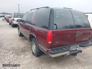 1999 Chevrolet Tahoe with VIN 1GNEC13R8XJ511786, listed as a IAAI auction lot 41538890 with 196,764 mi miles. Bid and sale history available at carsss.com. Image 3.