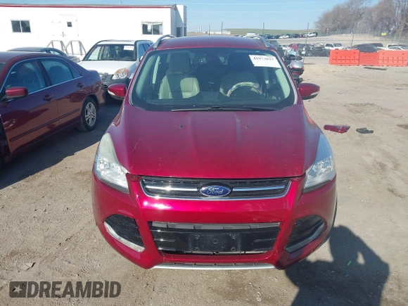 2014 Ford Escape Titanium with VIN 1FMCU9J98EUC24857, listed as a IAAI auction lot 41973037 with 160,634 mi miles. Bid and sale history available at carsss.com. Image 13.