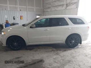 2016 Dodge Durango R/T with VIN 1C4SDJCT0GC419015, listed as a IAAI auction lot 41712230 with 159,523 mi miles and . Bid and sale history available at DreamBid. Image 14.