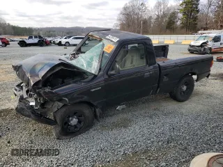 1999 Ford Ranger XL with VIN 1FTYR10C0XTA88744, listed as a Copart auction lot 44258415 with 202,709 mi miles and Salvage title. Bid and sale history available at DreamBid. Image 1.
