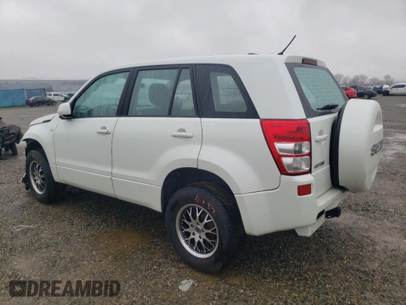 2008 Suzuki Grand Vitara w/Spare & Cargo Covers с VIN JS3TD941884102404, выставлен на аукционе Copart как лот 86215464 с пробегом 116 173 миль миль и Списание • Salvage title. История ставок и продаж доступна на DreamBid. Изображение 2.