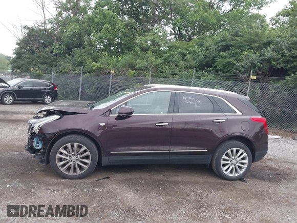 2017 Cadillac XT5 Platinum AWD z VIN 1GYKNFRS2HZ224860, wystawiony jako IAAI lot #42272142 z przebiegiem 95 697 mil mil oraz . Historia ofert i sprzedaży dostępna na DreamBid. Obrazek 14.