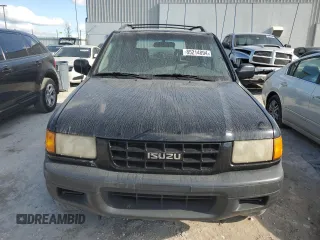 1999 Isuzu Rodeo S with VIN 4S2CK58W7X4357230, listed as a Copart auction lot 85214894 with 130,370 mi miles and Salvage title. Bid and sale history available at DreamBid. Image 5.