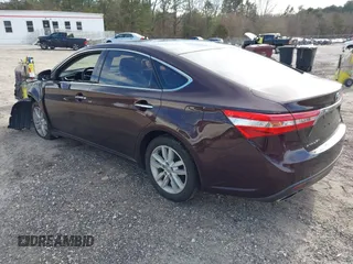 2013 Toyota Avalon XLE with VIN 4T1BK1EB1DU026863, listed as a IAAI auction lot 41644969 with 190,020 mi miles and . Bid and sale history available at DreamBid. Image 3.