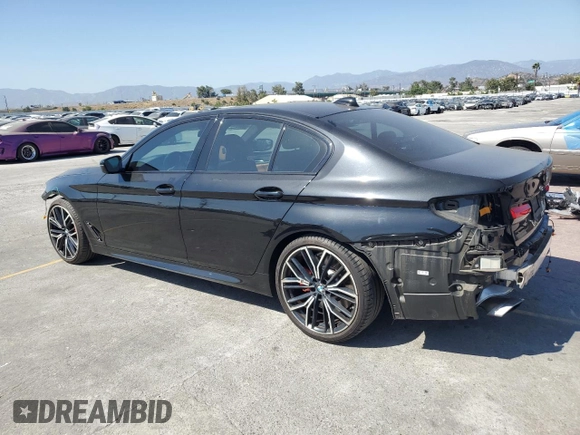 2021 BMW 5 Series 540i with VIN WBA53BJ05MWW92487, listed as a Copart auction lot 57679975 with 53,311 mi miles and Salvage title. Bid and sale history available at DreamBid. Image 2.