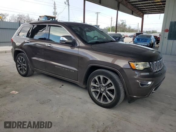 2017 Jeep Grand Cherokee Overland with VIN 1C4RJFCTXHC768687, listed as a Copart auction lot 51442495 with 123,578 mi miles and Clean Title. Bid and sale history available at carsss.com. Image 4.