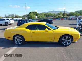 2017 Dodge Challenger SXT z VIN 2C3CDZAG3HH501610, wystawiony jako IAAI lot #42163027 z przebiegiem 66 464 mil mil oraz . Historia ofert i sprzedaży dostępna na DreamBid. Obrazek 13.