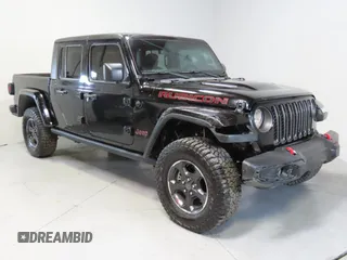 2023 Jeep Gladiator Rubicon with VIN 1C6JJTBGXPL543787, listed as a Copart auction lot 50946015 with 5,402 mi miles and Clean Title. Bid and sale history available at carsss.com. Image 1.