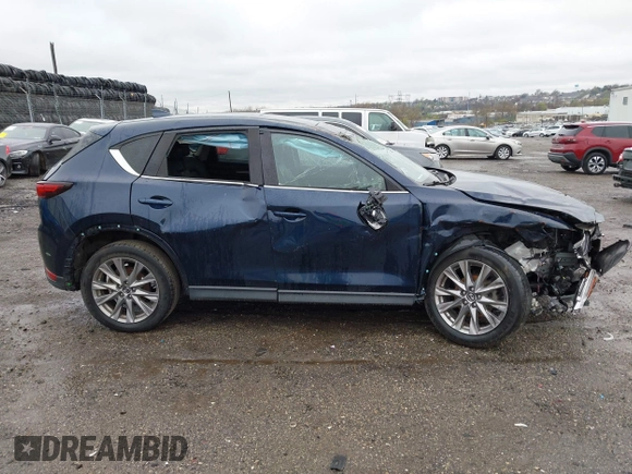 2019 Mazda CX-5 Grand Touring with VIN JM3KFBDM6K0592496, listed as a IAAI auction lot 41730103 with Not Provided miles and . Bid and sale history available at carsss.com. Image 12.