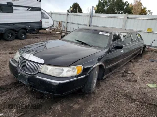 2000 Lincoln Town Car Executive with VIN 1L1FM81W3YY771708, listed as a Copart auction lot 79297484 with Not provided miles and Salvage title. Bid and sale history available at DreamBid. Image 1.