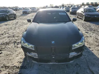 2016 BMW 7 Series 750i with VIN WBA7F0C5XGGL99048, listed as a Copart auction lot 84815364 with 96,743 mi miles and Salvage Title. Bid and sale history available at carsss.com. Image 5.