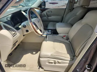 2016 Infiniti QX80 with VIN JN8AZ2NE2G9123772, listed as a Copart auction lot 63665105 with 98,304 mi miles and Salvage title. Bid and sale history available at DreamBid. Image 7.
