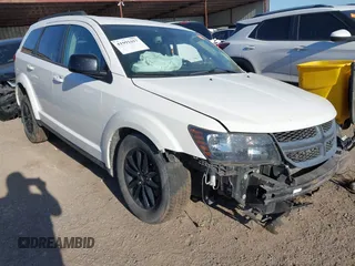 2019 Dodge Journey SE z VIN 3C4PDCBB1KT845139, wystawiony jako IAAI lot #41991017 z przebiegiem 109 967 mil mil oraz . Historia ofert i sprzedaży dostępna na DreamBid. Obrazek 1.