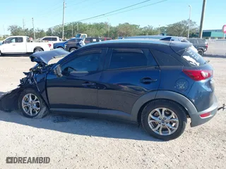 2017 Mazda CX-3 Sport with VIN JM1DKFB73H0159678, listed as a IAAI auction lot 40953743 with 99,696 mi miles. Bid and sale history available at carsss.com. Image 14.