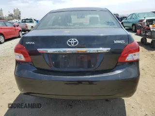 2009 Toyota Yaris z VIN JTDBT903394052355, wystawiony jako Copart lot #58447075 z przebiegiem 166 172 mil mil oraz Tytuł czysty. Historia ofert i sprzedaży dostępna na DreamBid. Obrazek 6.