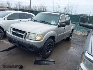 2003 Ford Explorer Sport Trac XLS with VIN 1FMZU77E63UC31712, listed as a IAAI auction lot 41645392 with 250,381 mi miles. Bid and sale history available at carsss.com. Image 2.