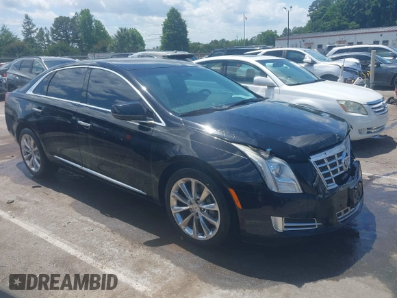 2013 Cadillac XTS Luxury z VIN 2G61P5S37D9101989, wystawiony jako IAAI lot #42242641 z przebiegiem 243 006 mil mil oraz . Historia ofert i sprzedaży dostępna na DreamBid. Obrazek 13.