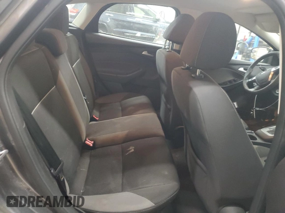 2014 Ford Focus SE z VIN 1FADP3K2XEL255540, wystawiony jako Copart lot #57070215 z przebiegiem 236 707 mil mil oraz Czysty tytuł • Clean title. Historia ofert i sprzedaży dostępna na DreamBid. Obrazek 10.