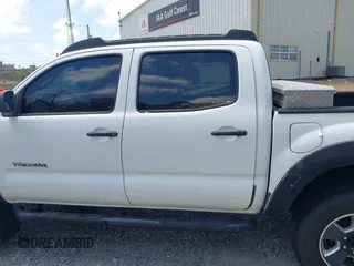 2009 Toyota Tacoma PreRunner with VIN 3TMJU62NX9M091048, listed as a IAAI auction lot 42272791 with 208,257 mi miles and . Bid and sale history available at DreamBid. Image 14.