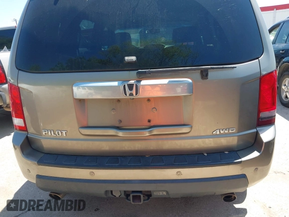 2011 Honda Pilot Touring with VIN 5FNYF4H94BB021952, listed as a IAAI auction lot 41985940 with 170,043 mi miles. Bid and sale history available at carsss.com. Image 15.