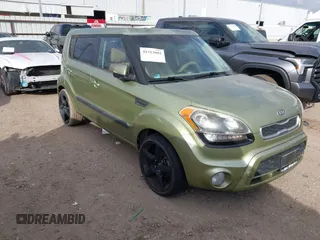 2012 Kia Soul + with VIN KNDJT2A69C7398380, listed as a IAAI auction lot 41523001 with 128,583 mi miles. Bid and sale history available at carsss.com. Image 1.