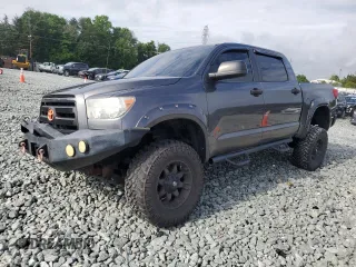 2012 Toyota Tundra with VIN 5TFDY5F13CX237763, listed as a Copart auction lot 57169615 with 176,335 mi miles and Clean title. Bid and sale history available at DreamBid. Image 1.