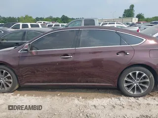 2017 Toyota Avalon XLE z VIN 4T1BK1EB3HU245765, wystawiony jako IAAI lot #42197337 z przebiegiem 173 649 mil mil oraz . Historia ofert i sprzedaży dostępna na DreamBid. Obrazek 14.