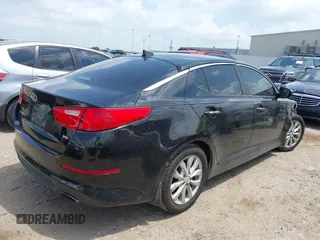 2015 Kia Optima LX z VIN 5XXGM4A73FG507178, wystawiony jako IAAI lot #42146877 z przebiegiem 165 348 mil mil oraz . Historia ofert i sprzedaży dostępna na DreamBid. Obrazek 4.
